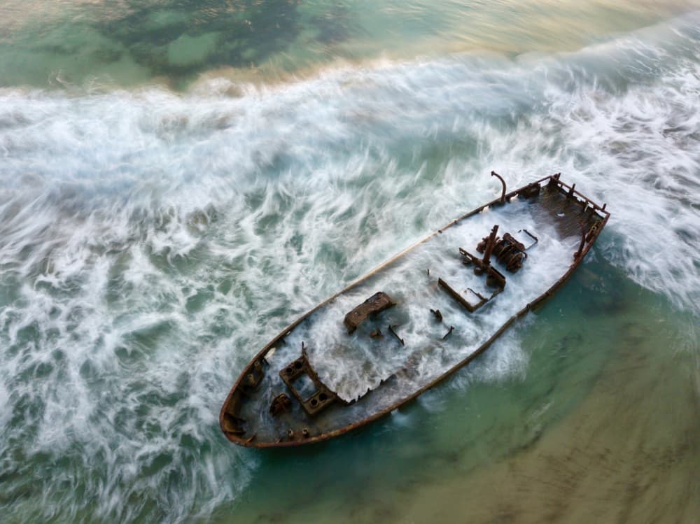 Abandoned Shipwrecked Boat by eMunther — canvas wall art