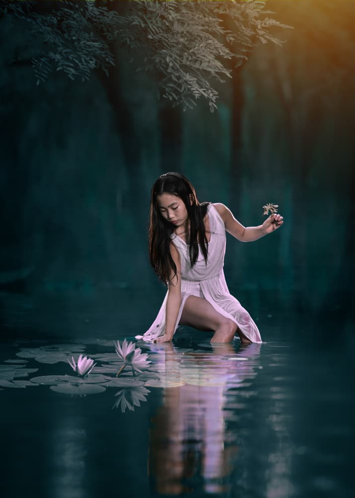 Woman Among Water Lilies by Rob Li — canvas wall art