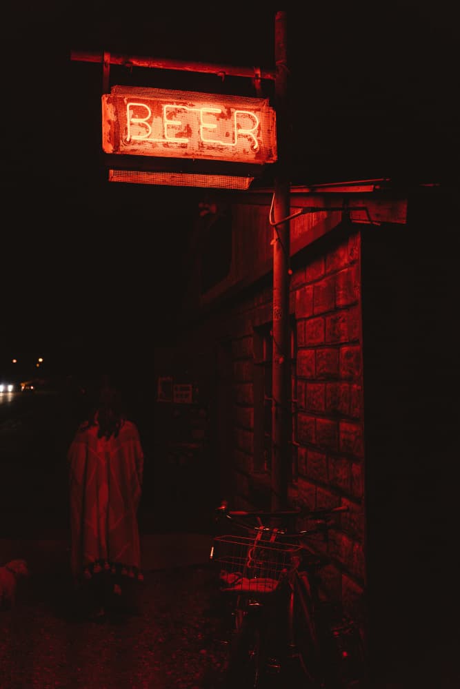 Red Beer Sign Night by Bethany Young — canvas wall art