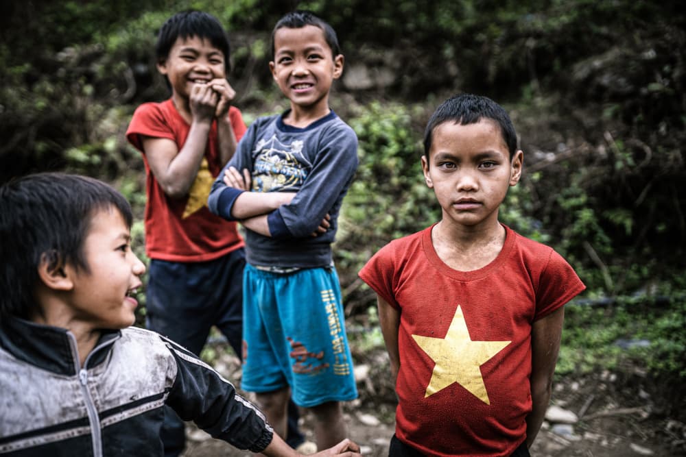 Vietnamese Village Boys by Marco Tagliarino — canvas wall art