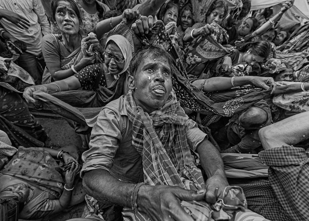 Raw Emotion in Crowd by Shaibal Nandi — canvas wall art