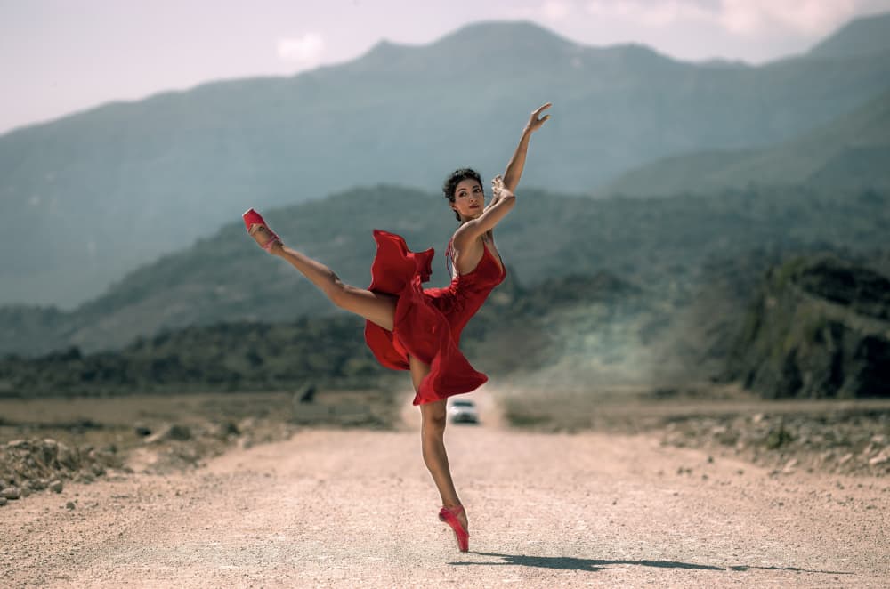 Red Dress Mountain Ballet by Waldemar Szmidt — canvas wall art