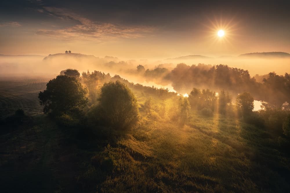 Misty Golden Sunrise by Karol Nienartowicz — canvas wall art