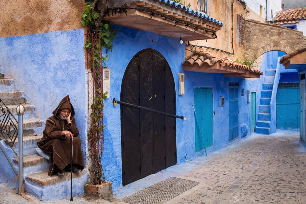 Old Man Blue City by Dan Mirica — canvas wall art