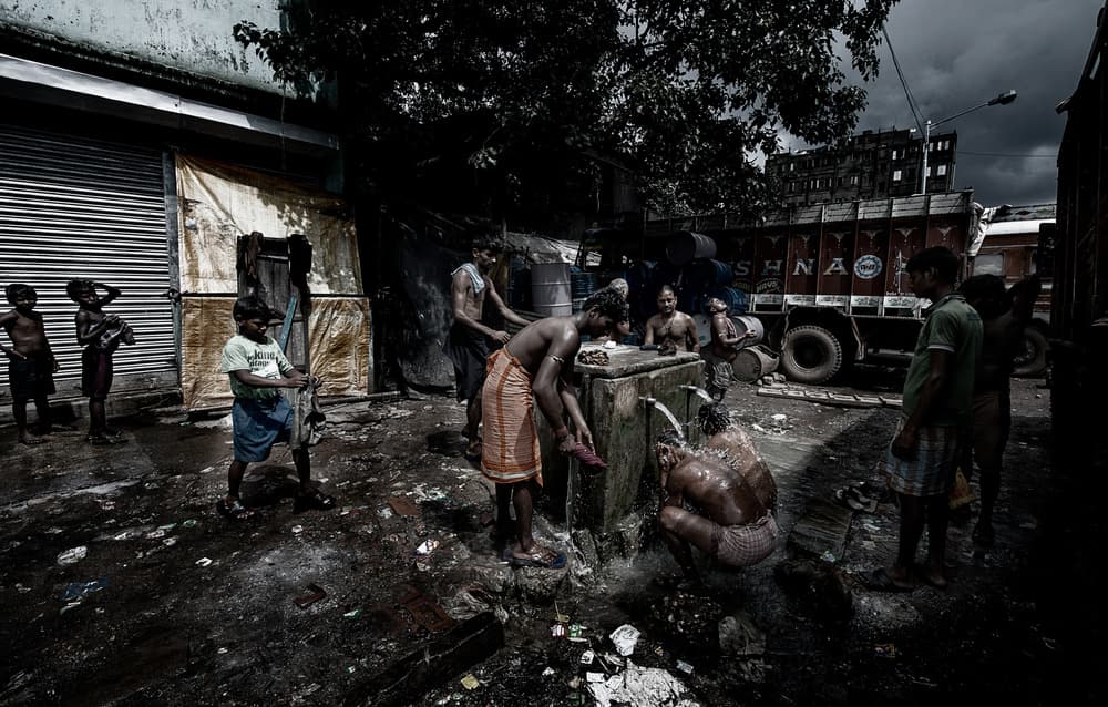 Indian Street Bathing by Joxe Inazio Kuesta Garmendia — canvas wall art