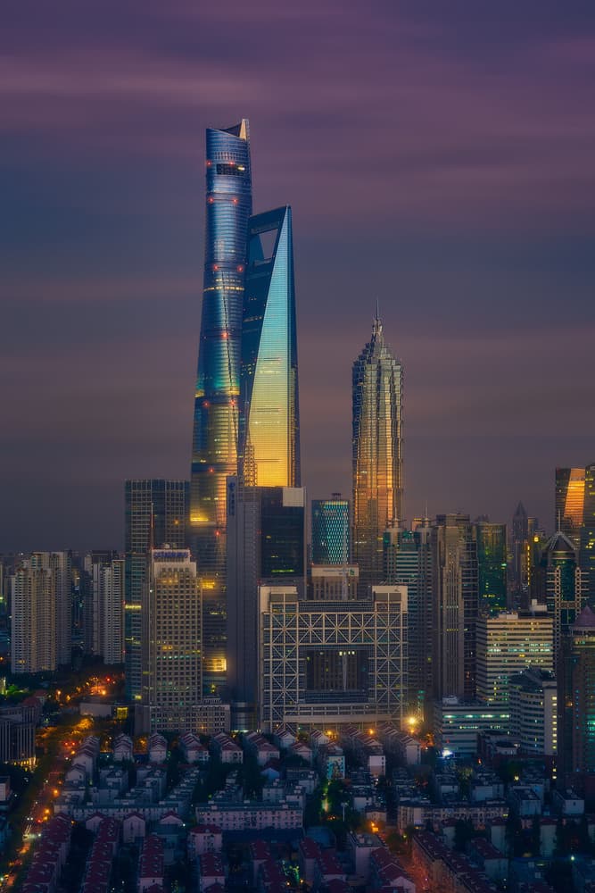 Illuminated City Skyline by Javier de la Torre — canvas wall art