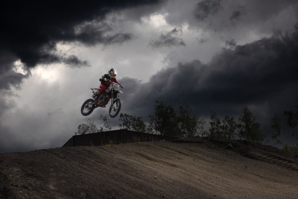 Flying Dirt Bike Stormy Sky by Clas Gustafson PRO — canvas wall art