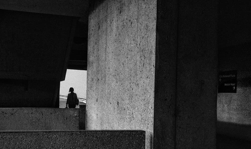 Contemplation Amidst Concrete by Tina Kim — canvas wall art
