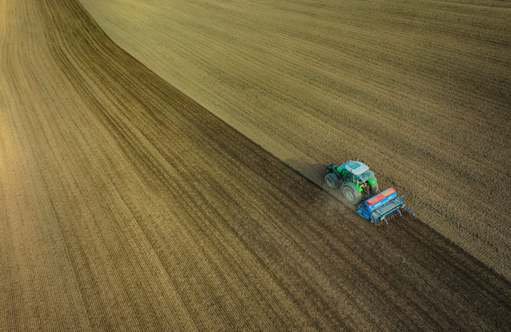 Green Tractor Planting by Guy Krier — canvas wall art