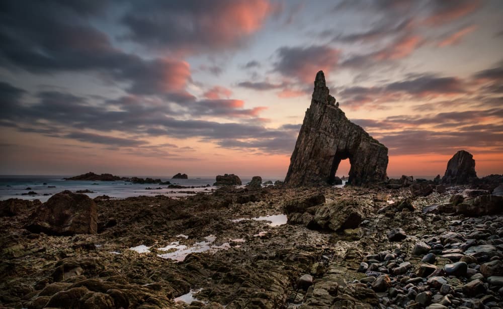 Dramatic Rock Arch Sunset by Anne Berger — canvas wall art