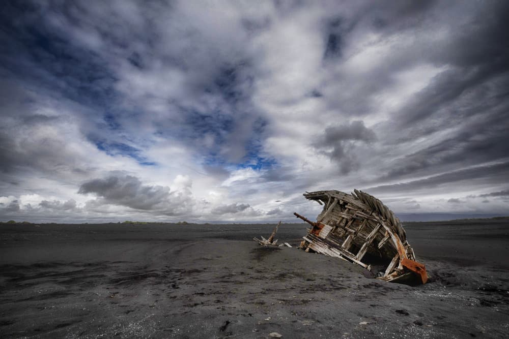 Shipwreck on Dark Sands by Þorsteinn H. Ingibergsson — canvas wall art