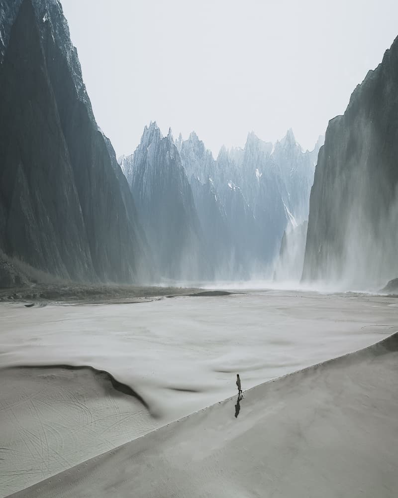 Misty Peaks Lone Traveler by Asad Sarfraz — canvas wall art
