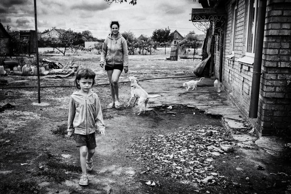 Child and Dogs Walk by Marcel Rebro — canvas wall art