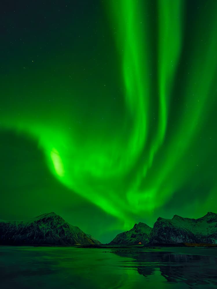 Green Northern Lights Display by Radek Pohnan — canvas wall art