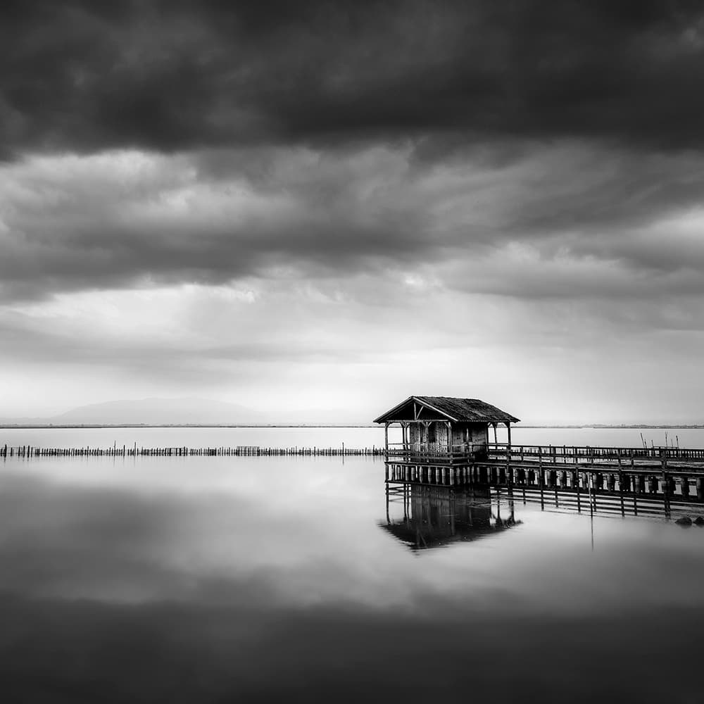 Moody Pier House Reflection by George Digalakis — canvas wall art