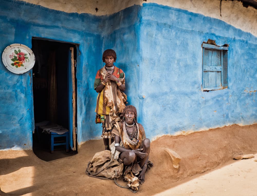 Indigenous Women Blue Wall by Melih Karakaya — canvas wall art