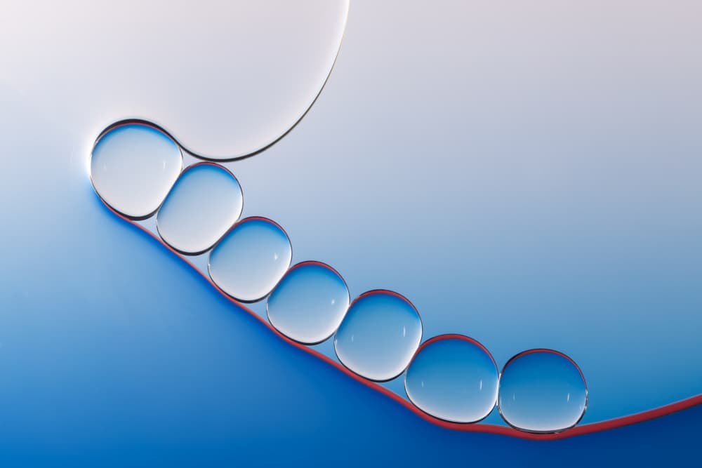Fluid Blue Droplets by Antonio Luis Martinez — canvas wall art