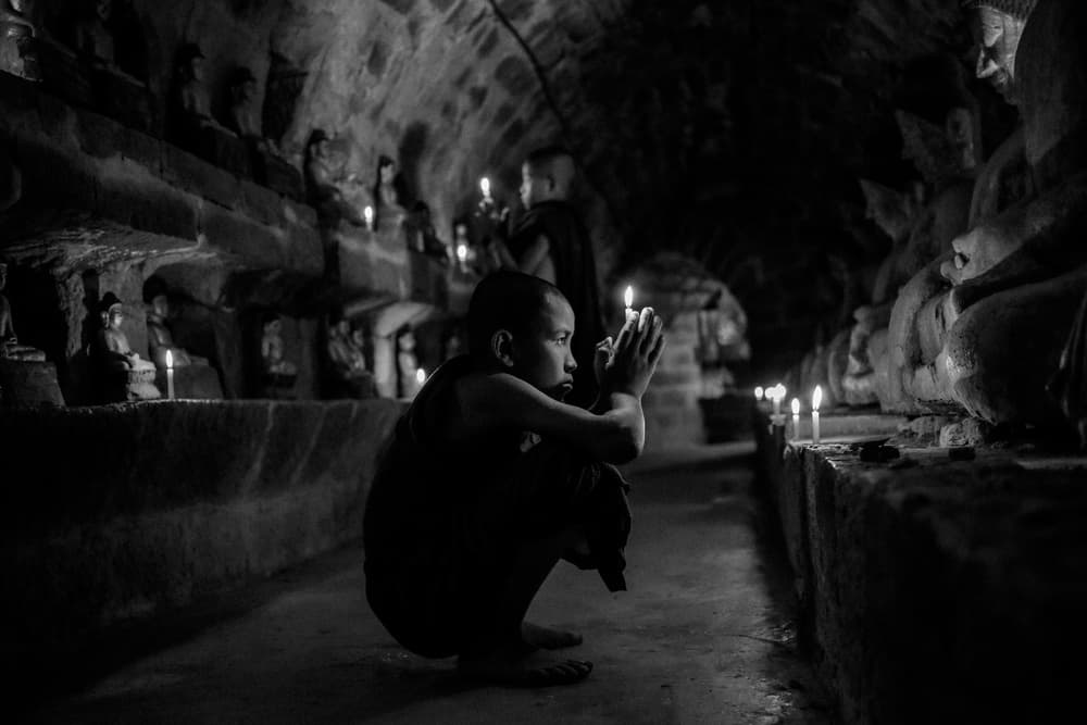 Monk's Candlelight Prayer by ADIREK M — canvas wall art