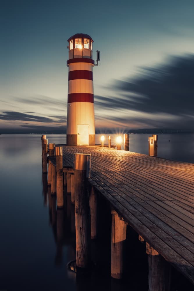 Glowing Lakeside Lighthouse by Ida Tittelova AFIAP — canvas wall art