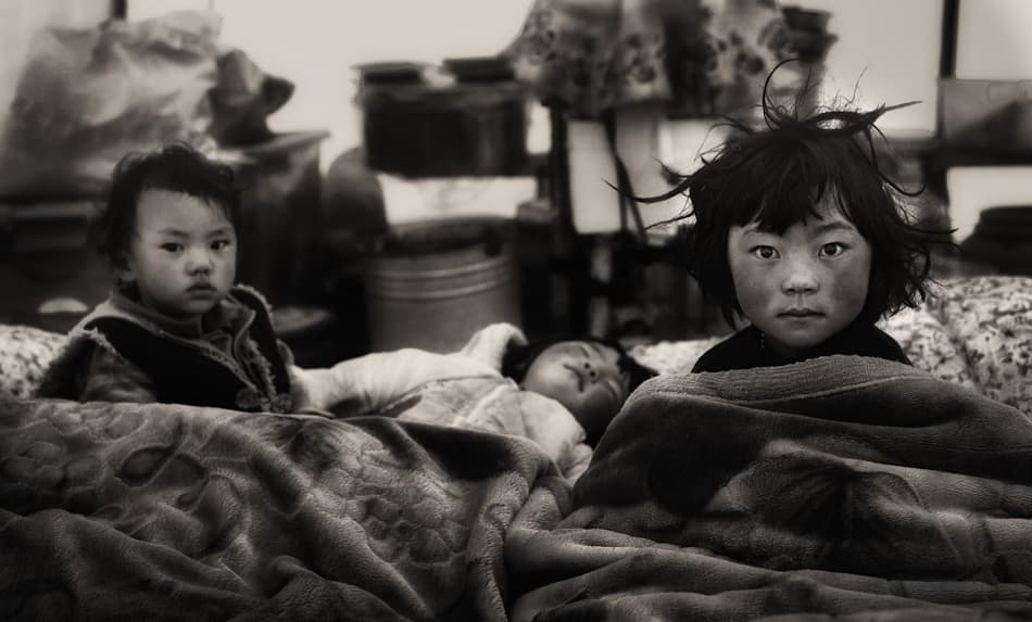 Children's Somber Gaze by Nicolas Marino — canvas wall art