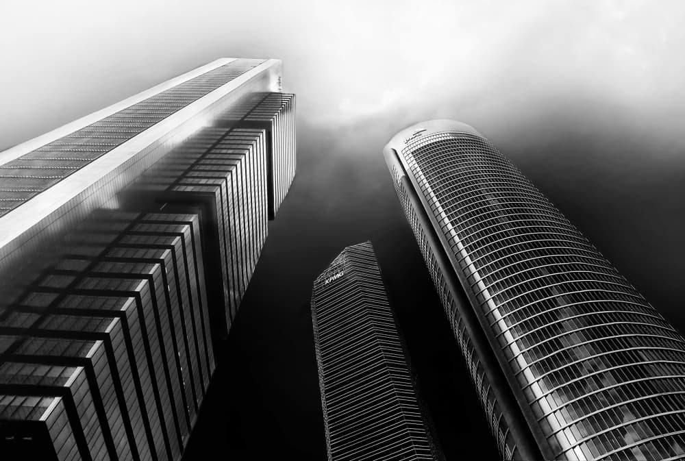 Urban Towers Skyward by Elena Arjona — canvas wall art