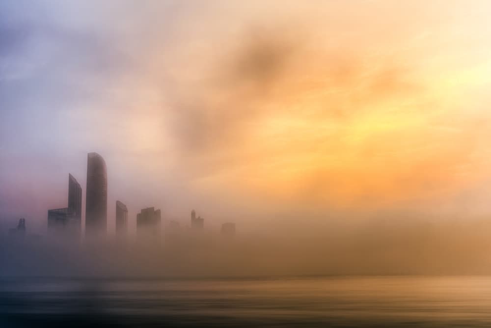 Golden Foggy City by Mohamed Kazzaz — canvas wall art