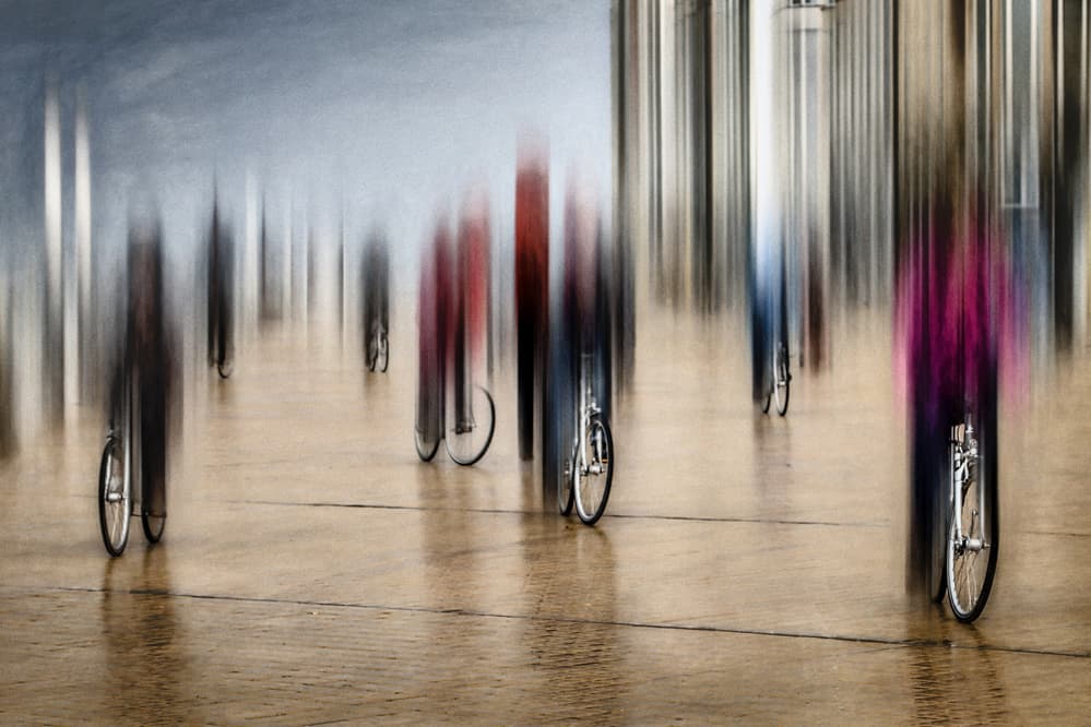 Blurred City Cyclists by Bruno Flour — canvas wall art