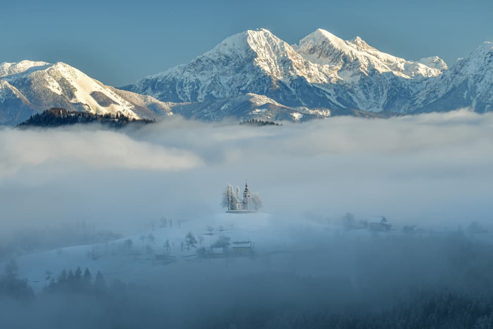 Alpine Church Foggy Morning by Bojan Kolman — canvas wall art