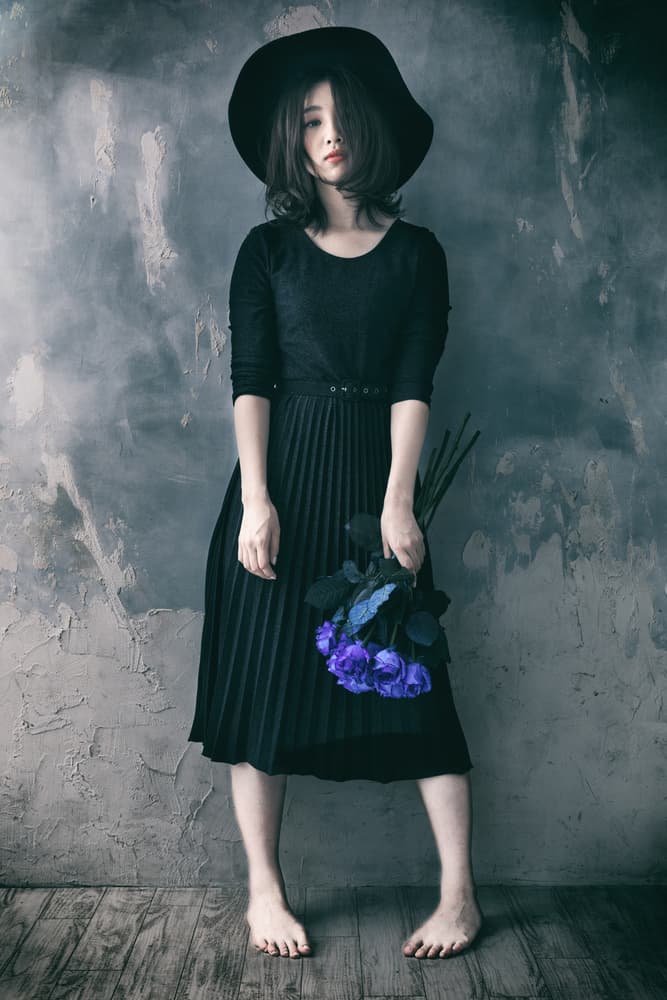 Elegant Woman Dark Hat by Daisuke Kiyota — canvas wall art