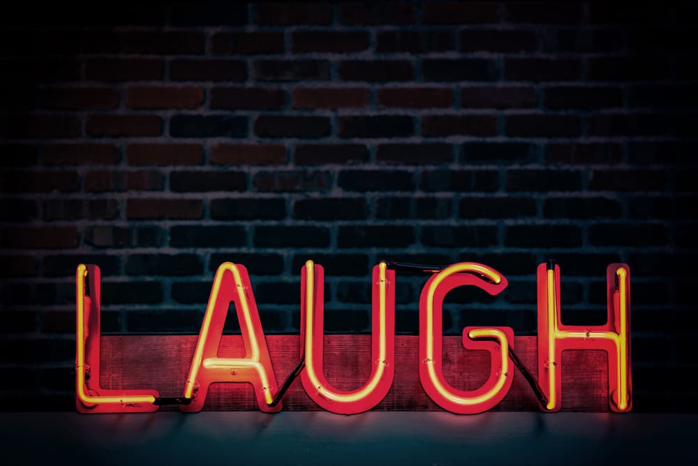 Laugh Neon Sign by Tim Mossholder — canvas wall art