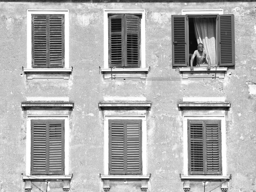 Man in Open Window by Marko Buntic — canvas wall art