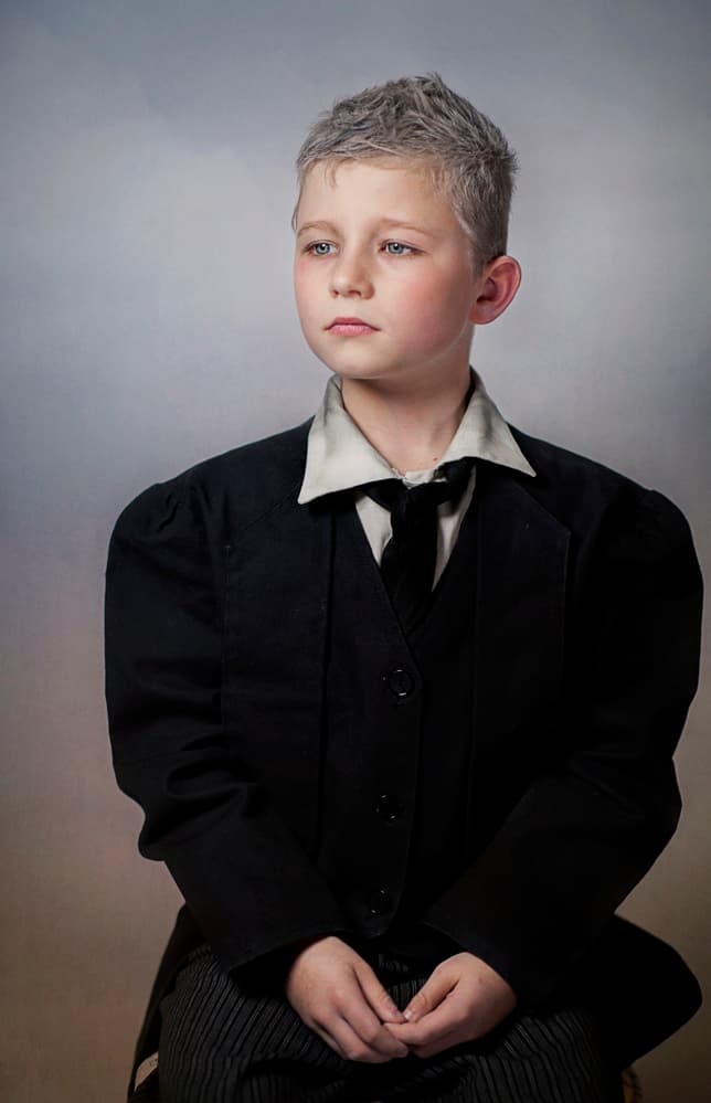 Pensive Boy Portrait by Monika Vanhercke — canvas wall art