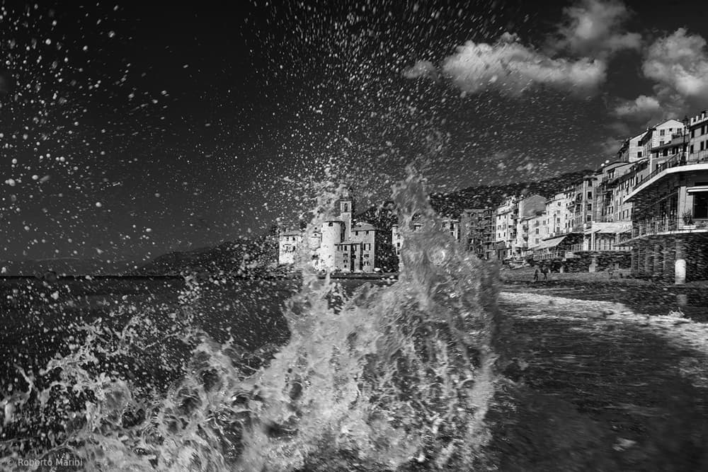 Crashing Waves Coastal Town by Roberto Marini — canvas wall art