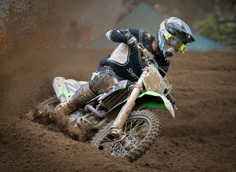 Extreme Motocross Action by Leeian Dai — canvas wall art