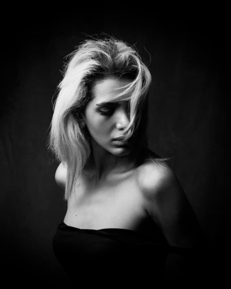 Moody Blonde Portrait by Mehdi Mokhtari — canvas wall art
