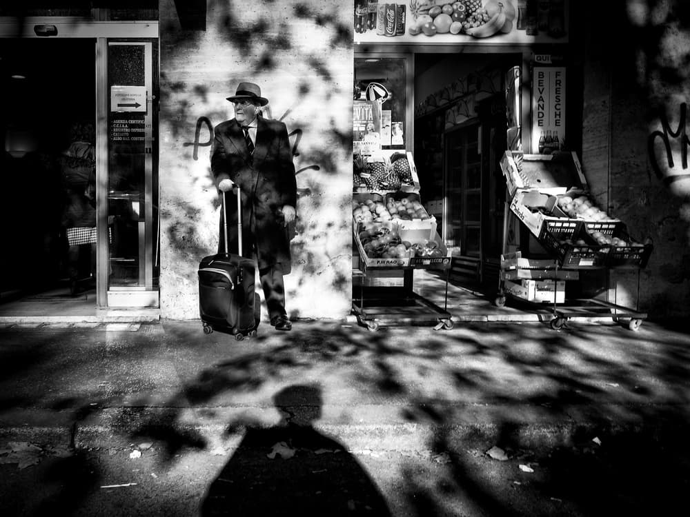 Noir Street Traveler by Riccardo Lucidi — canvas wall art