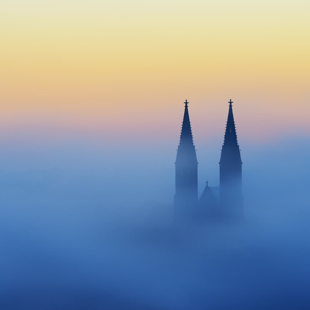 Foggy Church Spires by Marek Kijevský — canvas wall art