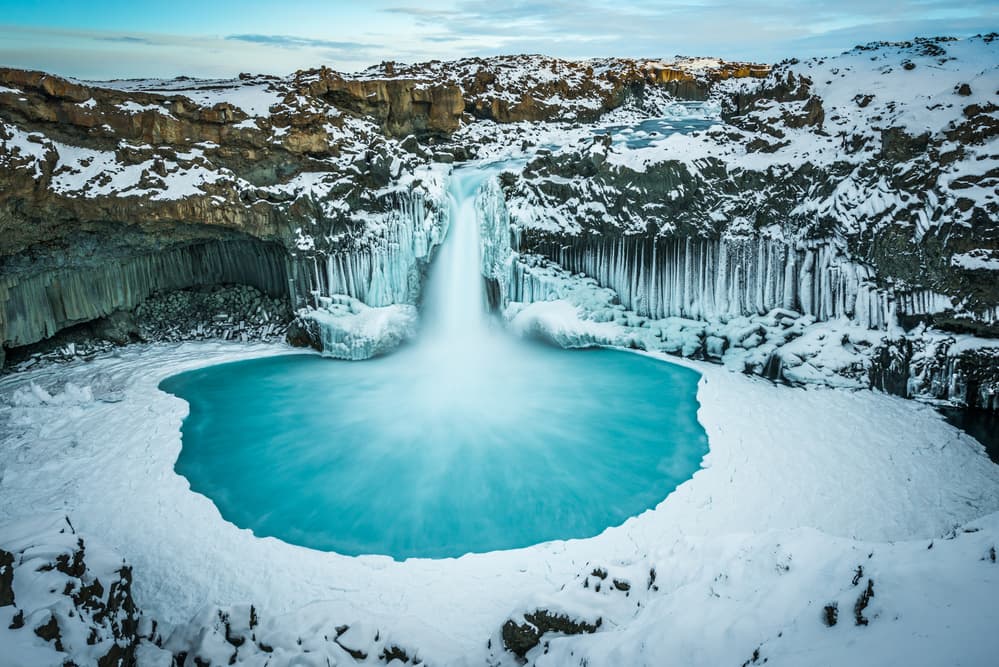 Icy Blue Waterfall by Jeffrey C. Sink — canvas wall art