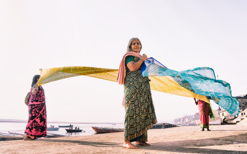 Women Drying Colorful Saris by Samara Ratnayake — canvas wall art