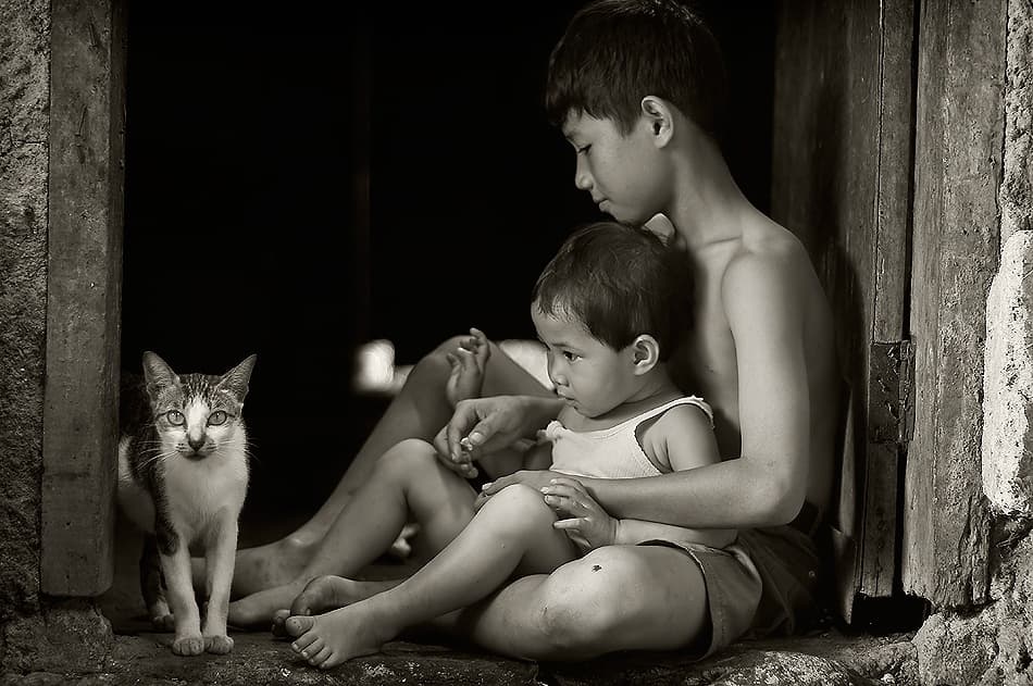 Children Cat in Doorway by Raymond Sitanggang — canvas wall art