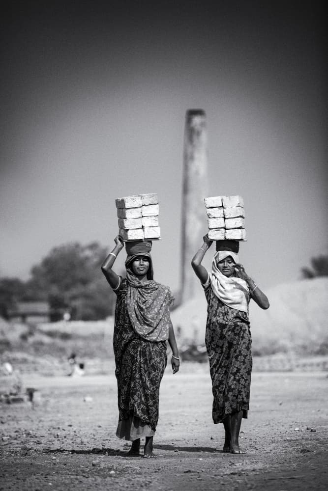 Women Carrying Bricks by Garik — canvas wall art