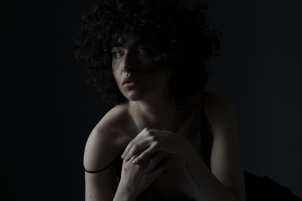 Dark Pensive Portrait by Marina Anghileri — canvas wall art