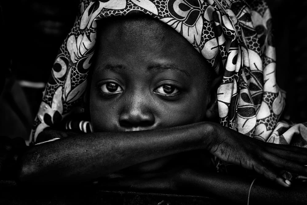 Pensive African Girl by Joxe Inazio Kuesta Garmendia — canvas wall art