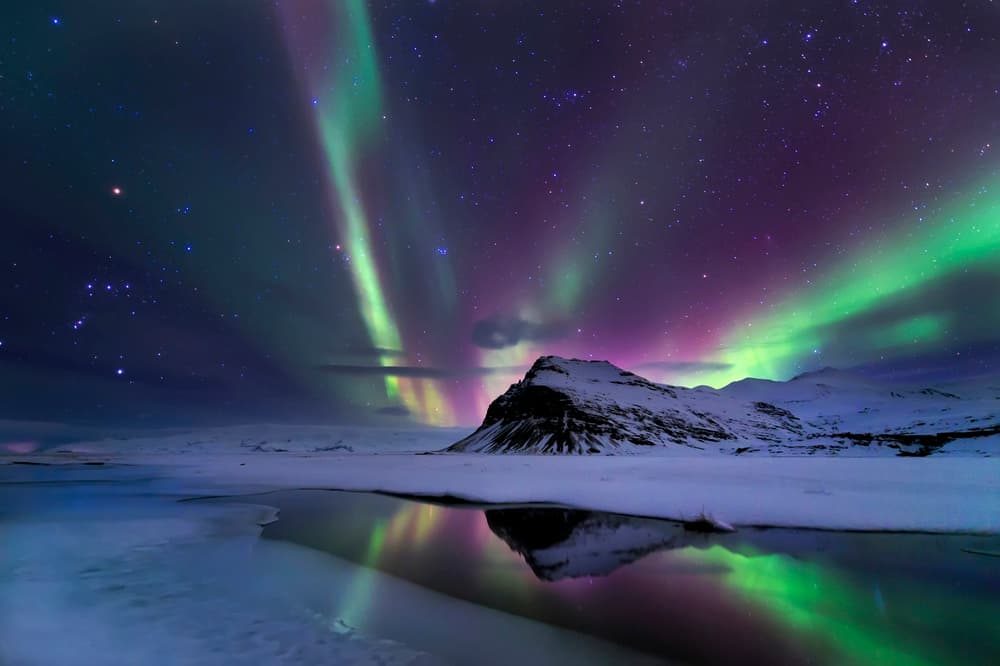 Northern Lights Winter Reflection by Andrea Auf dem Brinke — canvas wall art