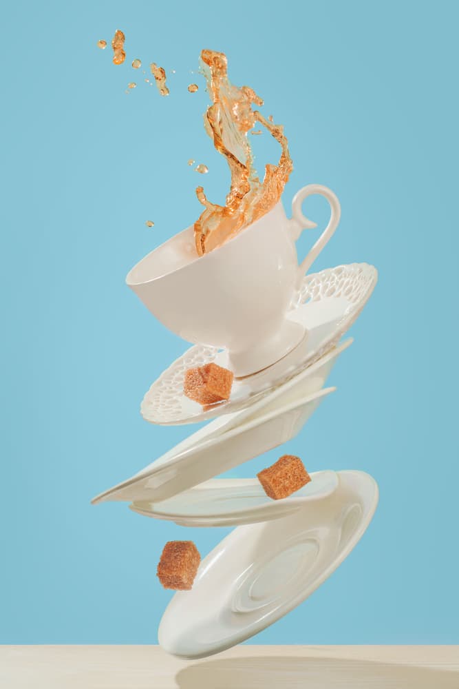 Dynamic Tea Cup Splash by Dina Belenko — canvas wall art