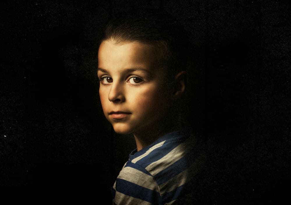 Thoughtful Boy Portrait by Amir Bajrich — canvas wall art