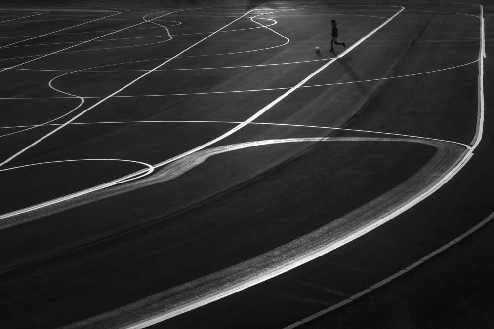 Solitary Soccer Play by Sebastian Prioteasa — canvas wall art
