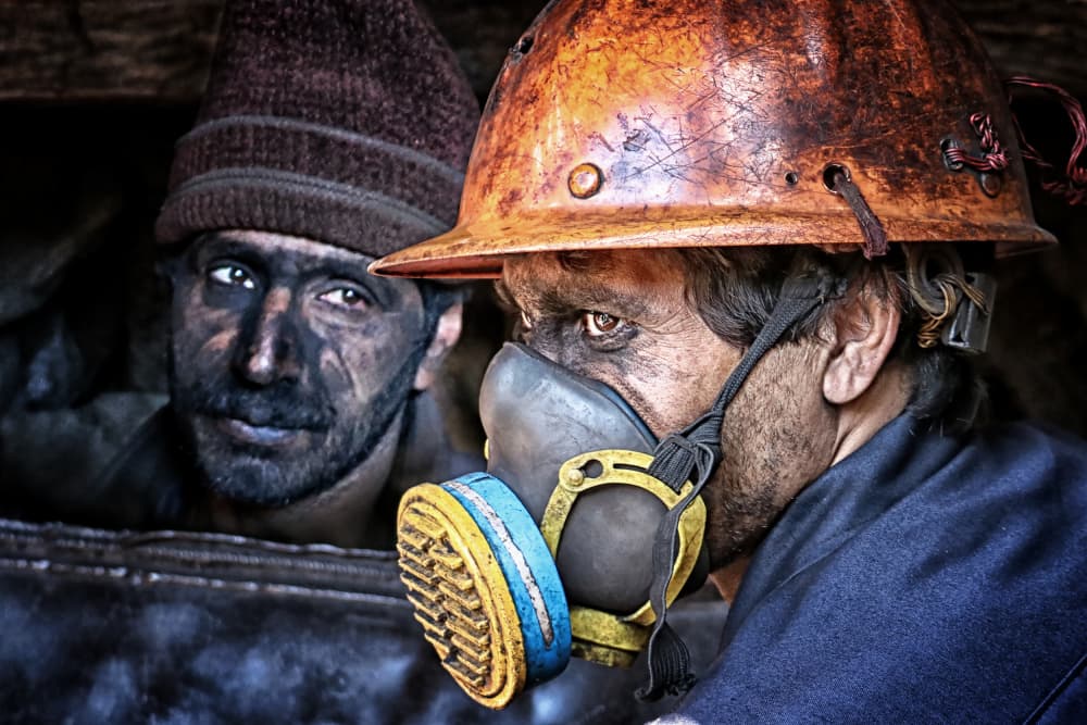 Coal Miners Intense Gaze by Marjan Taghipour — canvas wall art