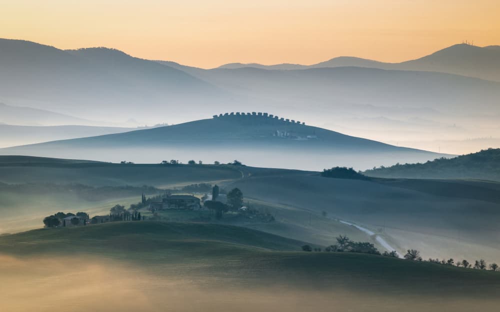 Sunrise Over Misty Hills by Sergio Barboni — canvas wall art
