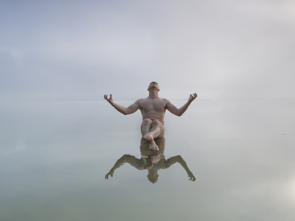 Floating Man Reflection by Leszek Paradowski — canvas wall art